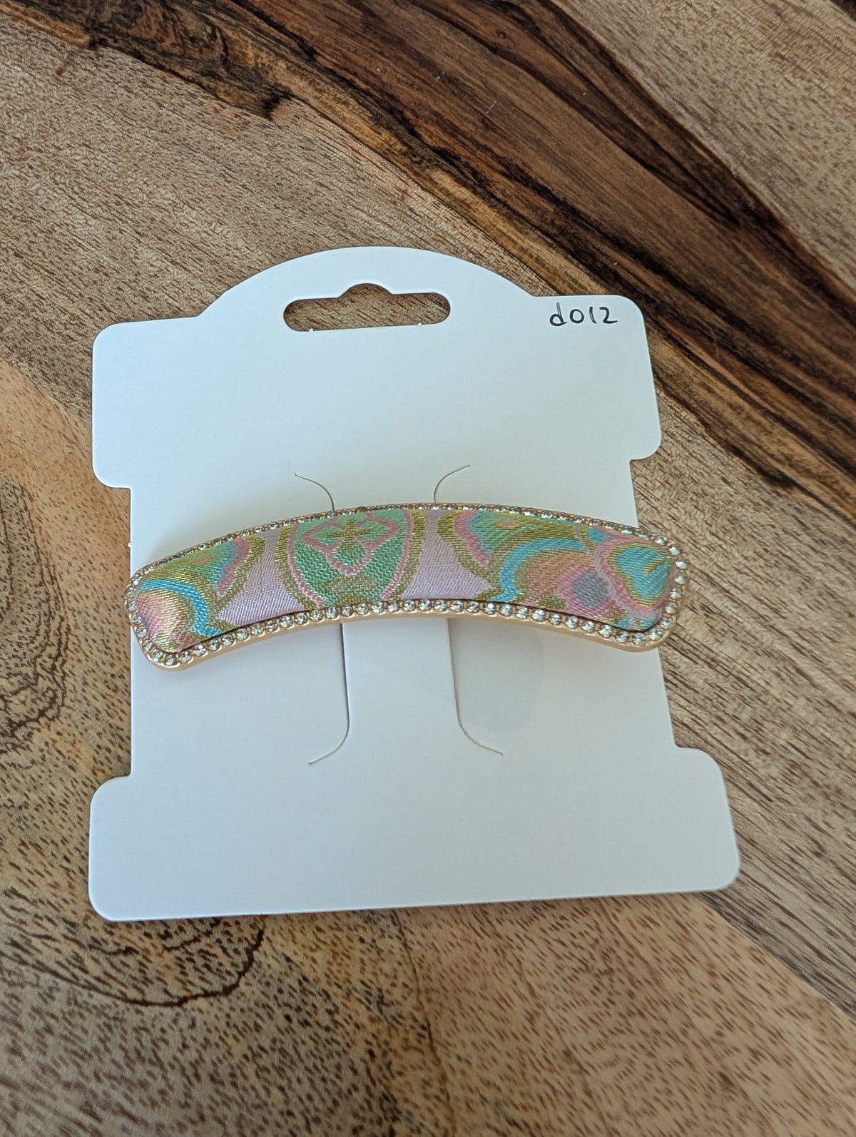 D012 - Rainbow Iridescent Song Brocade barrette on packaging card