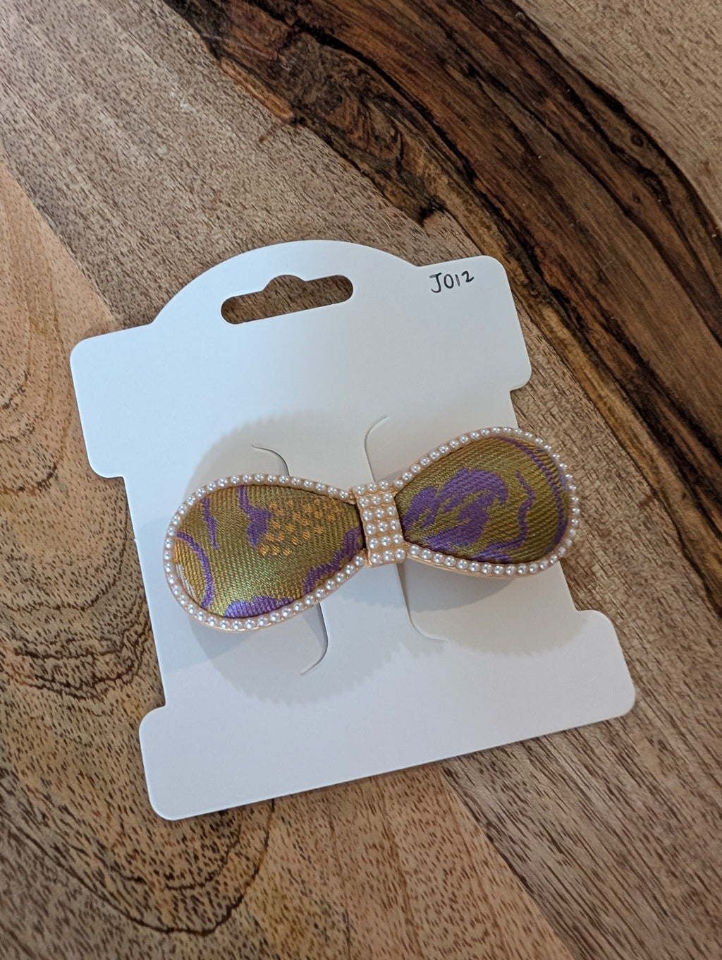 J012 Song Brocade bow hair clip gold purple – product flat lay