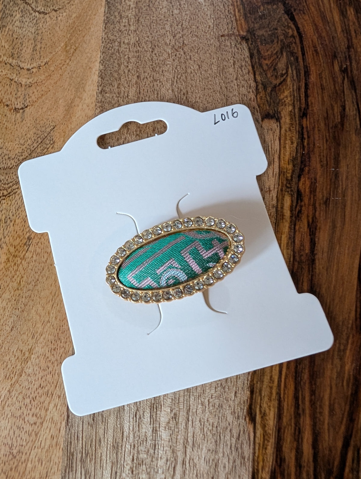 L016 - Teal & pink Song Brocade oval crystal hair clip on packaging card