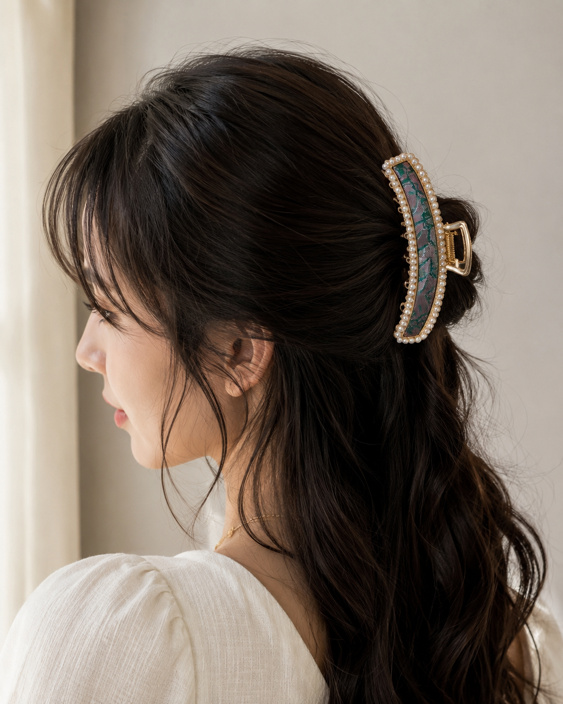 Model wearing blue Pearl-Trim Hair Claw Clip